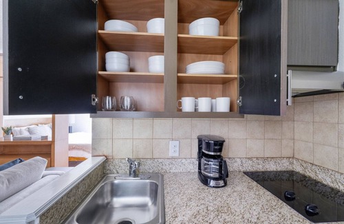 Gateway Apartment | Airy Gateway Studio w/Gym, Pool, nr Soccer, by Blueground