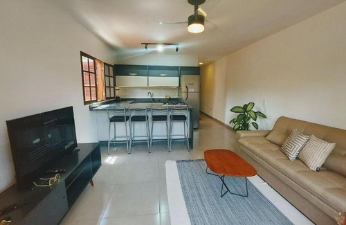 Jabaquara Apartment | Algodão - Novo Flat com Piscina, 50mts da praia, churrasqueira privativa, ar con, wi-fi, netflix, garagem