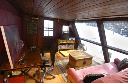 Taos House | An Enchanting Taos Hideaway in the Carson National Forest