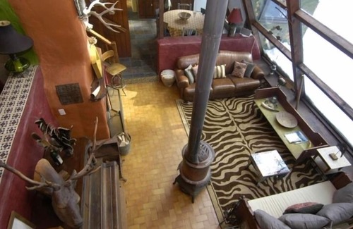 Taos House | An Enchanting Taos Hideaway in the Carson National Forest