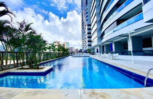 Caminho das Arvores Apartment | Apartamento ao lado do Shopping Salvador, piscina, academia, garagem