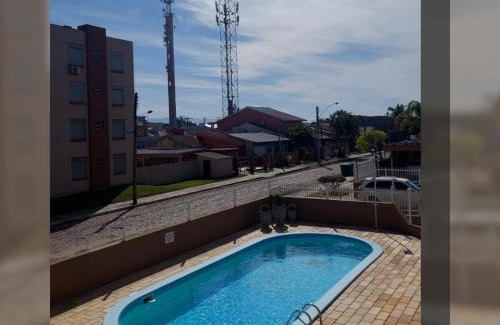 Arroio Teixeira Apartment | Apartamento com piscina, apenas 200 metros do mar