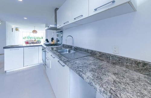 Puerto Juarez Condo | Apartamentos de lujo frente al Mar Caribe