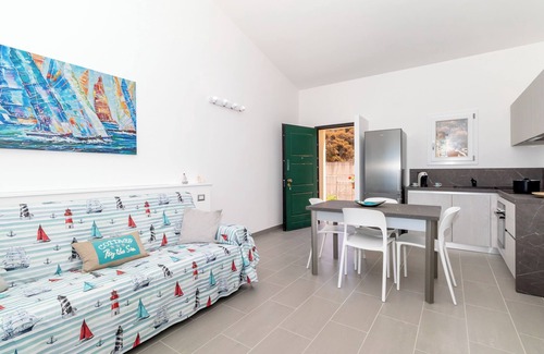 Trinita d'Agultu Apartment | Apartment Carolina House Near the Beach with Sea View, A/C, Wi-Fi, Terrace & Balcony