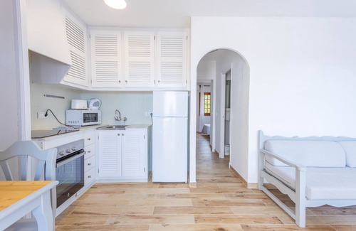 Sant Jaume Mediterrani Apartment | Apartment 'Son Bou Gardens Deluxe 1' with Shared Pool, Wi-Fi and Air Conditioning