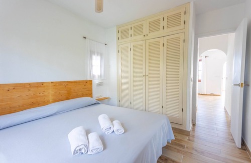 Sant Jaume Mediterrani Apartment | Apartment 'Son Bou Gardens Deluxe 1' with Shared Pool, Wi-Fi and Air Conditioning