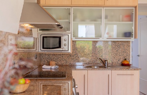 Cala en Blanes Apartment | Apartment 'Lurdes' with Mountain Views, Shared Pool and Air Conditioning
