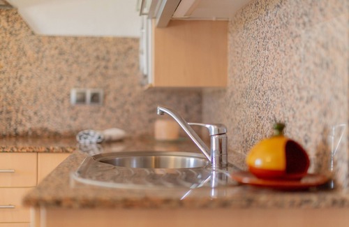Cala en Blanes Apartment | Apartment 'Lurdes' with Mountain Views, Shared Pool and Air Conditioning
