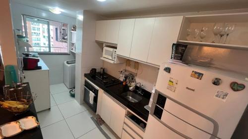 Marambaia Apartment | Apartment with a supermarket in front