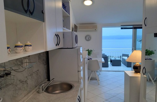 Ravni Apartment | APARTMENT WITH LARGE TERRACE AND MAGNIFICANT SEA VIEW, 300 m FROM THE BEACH +PS4