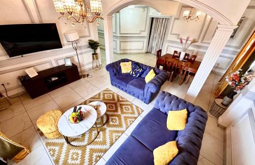 Douala Apartment | Appartement 2 et 1 chambres salon balcon canal sat wifi Netflix parking gardien 24 sur 24