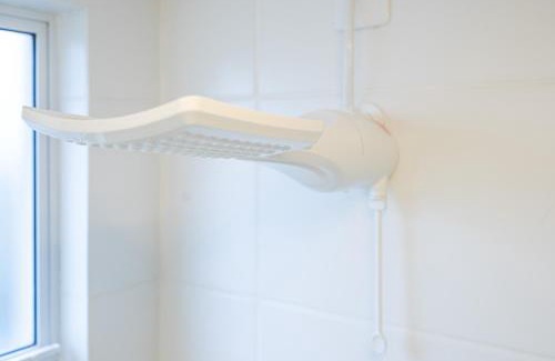 Nossa Senhora da Paz Apartment | Apto a 150m DA PRAIA e 15min BETO CARREIRO com WI-FI, PISCINA, PORTARIA 24h, PLAYGROUND INFANTIL, QUADRA DE ESPORTES sacada com CHURRASQUEIRA e vaga de GARAGEM