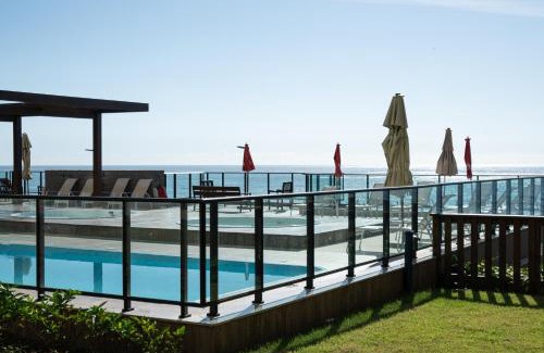 Barra Velha Apartment | Apto completo com vista mar pé na areia em Barra Velha em condomínio Resort com Spa, Piscina, quadra de futebol, Sala de jogos, brinquedoteca, Complexo com diversos comércios