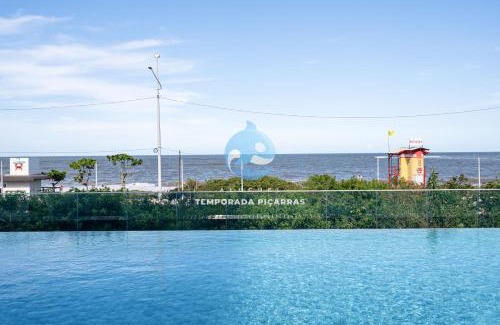Itacolomi Apartment | Apto Pé na Areia Condomínio Resort Completo com Piscina borda Infinita, Beach Tennis, Academia, Sala de Jogos, Brinquedoteca, Playground e Portaria 24H 2 Quartos com Ar-Condicionado, Churrasqueira Privativa Reserve Agora e Viva essa Experiência
