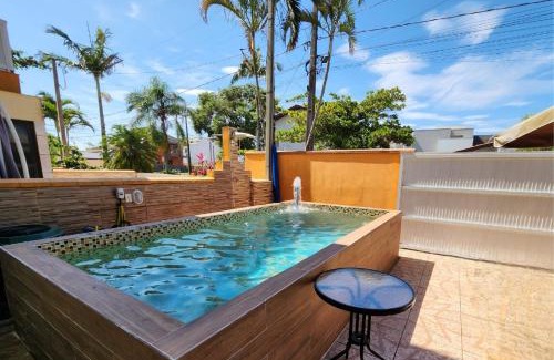 Pontal do Parana House | ATAMI STAY Casa em Condomínio com Piscina Aquecida pertinho do Mar