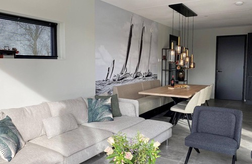 Balk House | Atmospheric sustainable villa in Balk with jetty