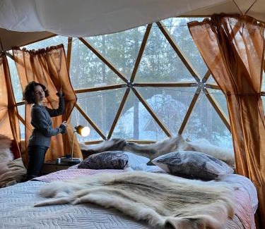 Rovaniemi Other | Aurora Igloo Fireplace-heated Tents in a secret forest with private Jacuzzi and shared sauna bathroom and dog friendly