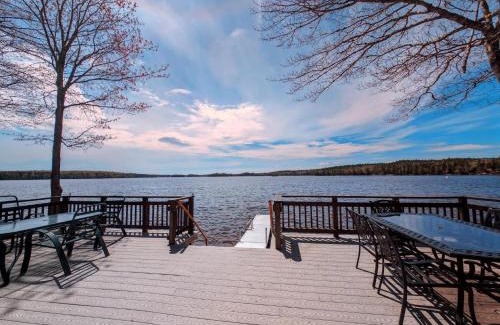 Sullivan House | Back of the Moon Lakefront Camp family watersports fire pit 1 dog beach sleeps 8