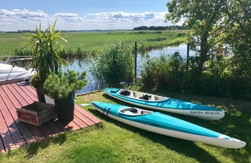 Swinoujscie Resort | Baltic Waterfront Yacht House - PRIVATE Garden & Watersports Included