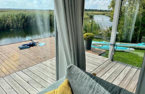 Swinoujscie Resort | Baltic Waterfront Yacht House - PRIVATE Garden & Watersports Included