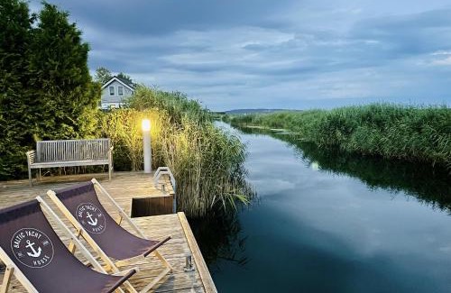 Swinoujscie Resort | Baltic Waterfront Yacht House - PRIVATE Garden & Watersports Included