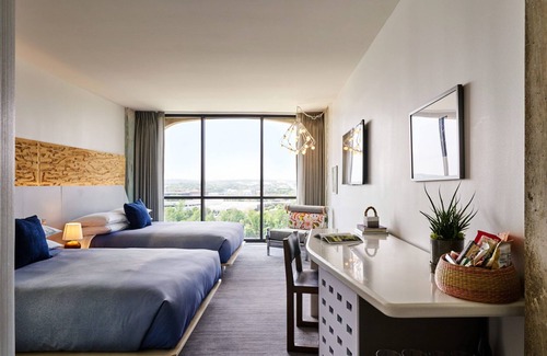 Congress Avenue Historic District Hotel | Bask in Modern Style Comfort! Downtown Views, Pet-friendly Property w/Pool