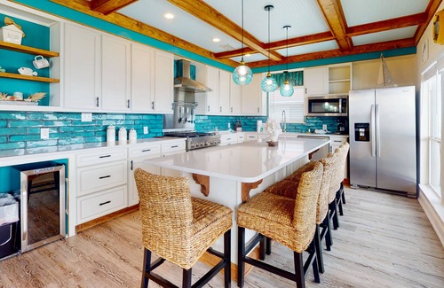 Royal Lagoons House | Bayfront home with boat slip, scenic balcony, W/D, & AC - close to beaches