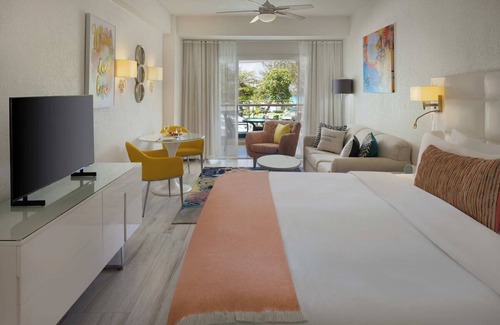 Blue Waters Hotel | Beach Break in Rockley Beach! Two Comfortable Suites, Pool, Free Breakfast!