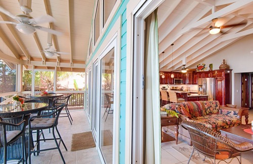 Orchid Beach Village House | BEACH front between W Bay & W End - POOL & DOCK - screen porch - Sunsets galore