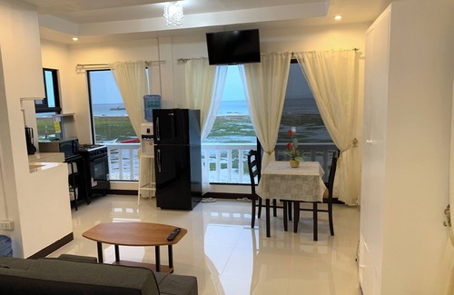 Oslob Apartment | Beach front Studio Unit Pet friendly Big yard and cottage