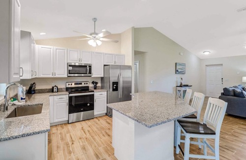 Trafalgar House | Beaches Are Open! Peaceful Freshwater Canal, Heated Pool, BBQ Grill, Fitness Equipment, Free WiFi!