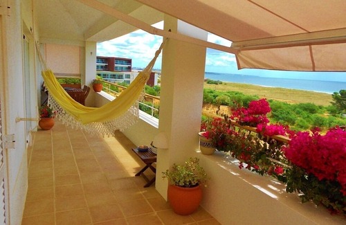 Meia Praia Apartment | Beachfront Apartment with Private Roof Terrace, BBQ, and Sea views