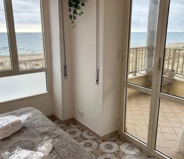 Torvaianica Apartment | Beachfront, balcony, parking, private access Beach
