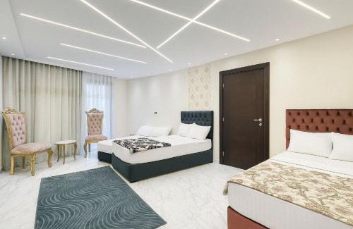 Al-Manasrah Ski Chalet | Beachfront Chalet in Porto Said with