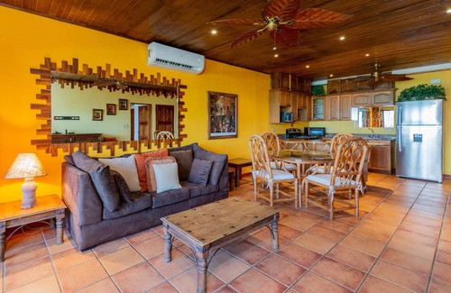 Playa Flamingo Condo | Beachfront Condo with Warm, Rustic Interiors & Direct Access to Playa Flamingo