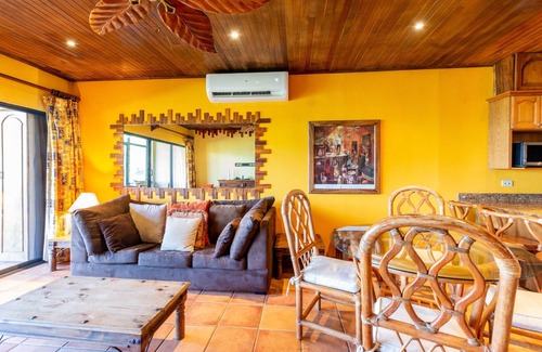 Playa Flamingo Condo | Beachfront Condo with Warm, Rustic Interiors & Direct Access to Playa Flamingo