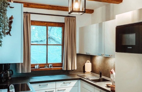 Pfarrwerfen House | Beautiful apartment in villa for 6 guests with WIFI, TV, terrace, pets allowed and parking