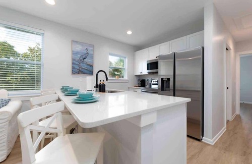 Neptune Beach Apartment | Beautiful beach condo - walk to the beach!