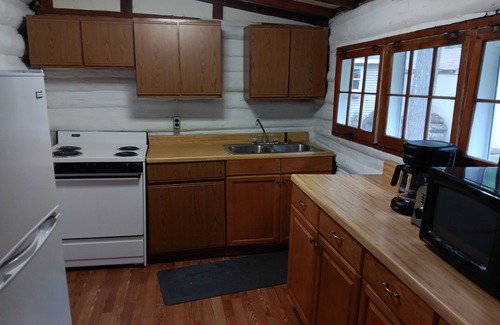 Kalkaska Cottage | Beautiful full log cabin with direct private frontage , beautiful sunsets .