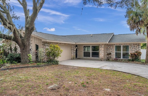 Bloomingdale House | Beautiful home with private pool and lake just minutes from major FL attractions