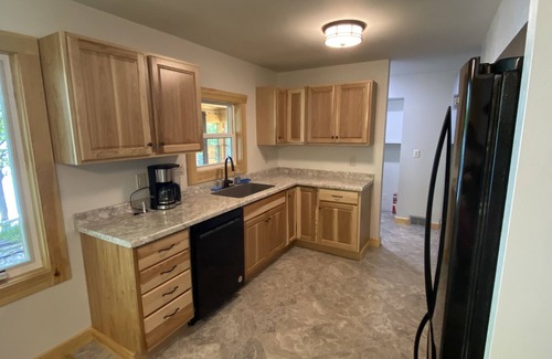 Iron River Cabin | Beautiful house on Camp Lake!