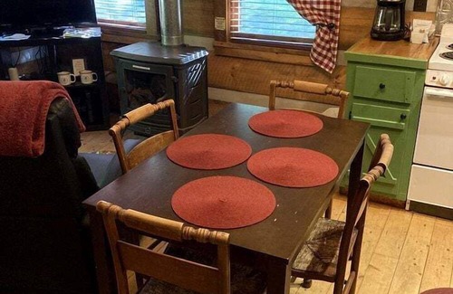 Elkin Cabin | Beautiful Waterfront Cabin with Hot Tub near Winston-Salem, North Carolina