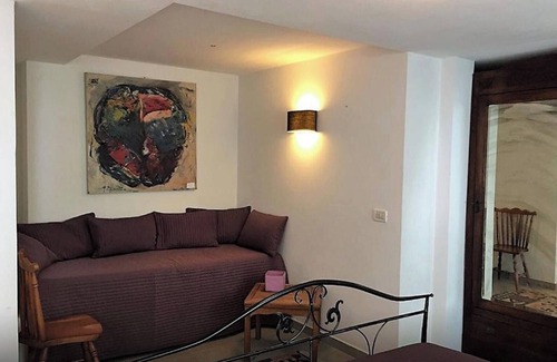 Palazzolo dello Stella Bed & Breakfast | Bed and Breakfast Loggia degli Artisti 'Spacious Room' with Pool, Wi-Fi and Air Conditioning