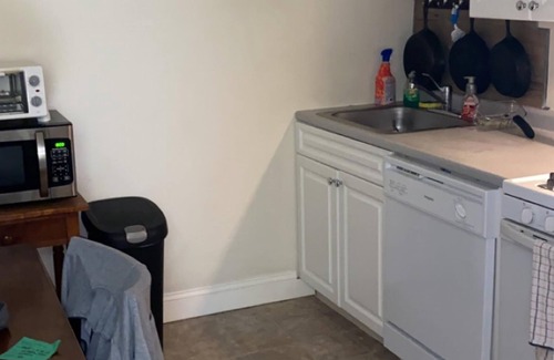 South Weymouth Apartment | Beds in living room space blocked off by curtains!