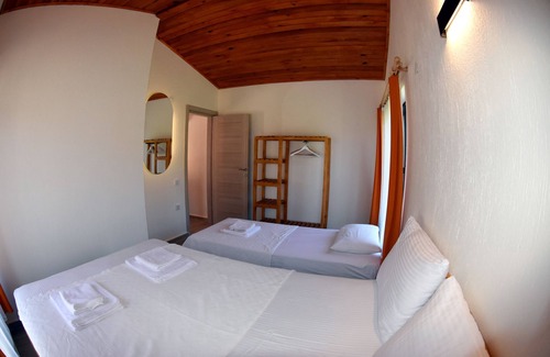 Hayitbuku Hotel | Begonvillage Tatil Evleri
