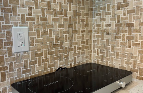 Greater Northdale Apartment | Bellagio a modern , spacious unit with a large balcony facing a golf course