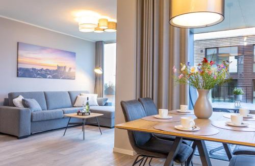 Marienleuchte Apartment | BeltBlick 16 - Moderne Ferienwohnung direkt an der Ostsee mit Meerblick und Sauna!