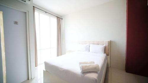 Siwalankerto Apartment | Best Choice and Homey Studio at The Square Surabaya Apartment By Travelio