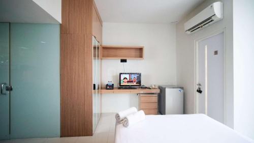 Siwalankerto Apartment | Best Choice and Homey Studio at The Square Surabaya Apartment By Travelio