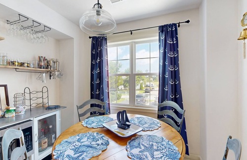 Ocean View House | Bethany Marina dog friendly bayfront townhouse w/pool, balcony, grill